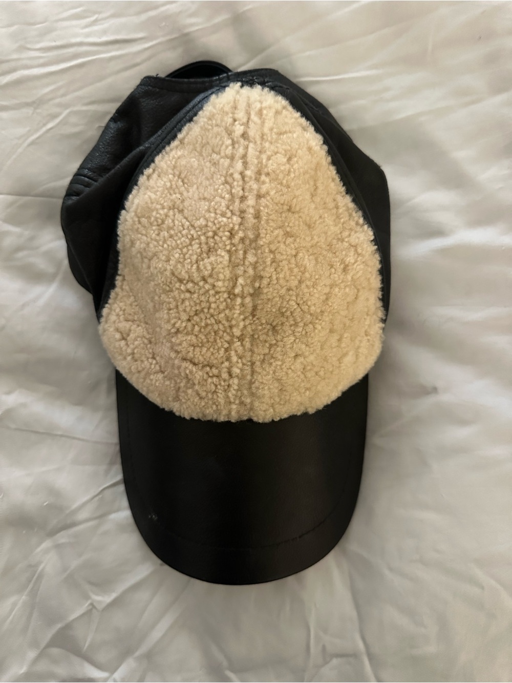 UGG Black Leather Cap with Cream Sherpa Front
